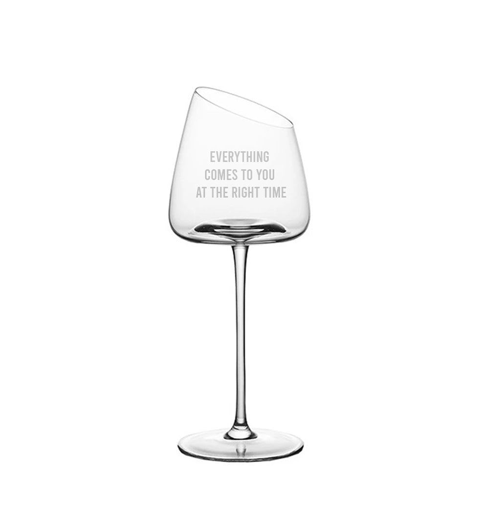Wine glass «EVERYTHING COMES TO YOU AT THE RIGHT TIME»